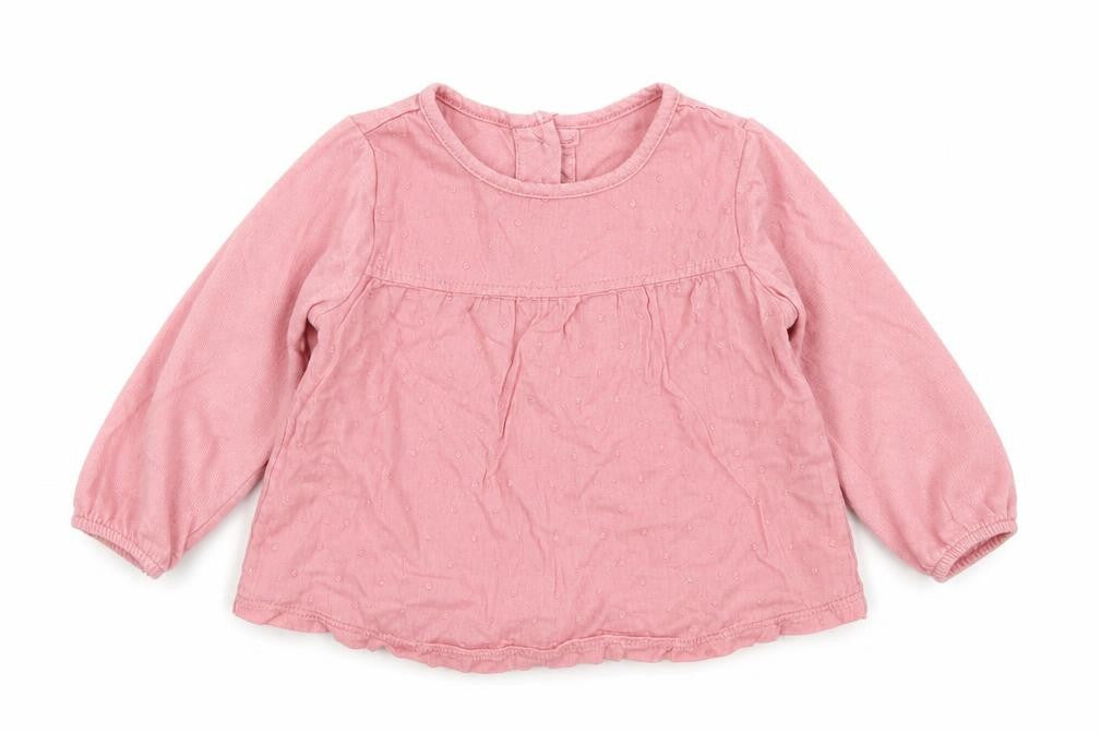 Front view of Matalan girls’ pink polka dot cotton basic t-shirt, size 3-6, months crew neck button