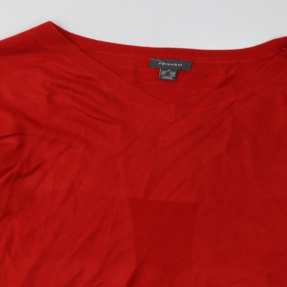 Close-up detail of Primark women’s red acrylic pullover sweatshirt, size M, pullover