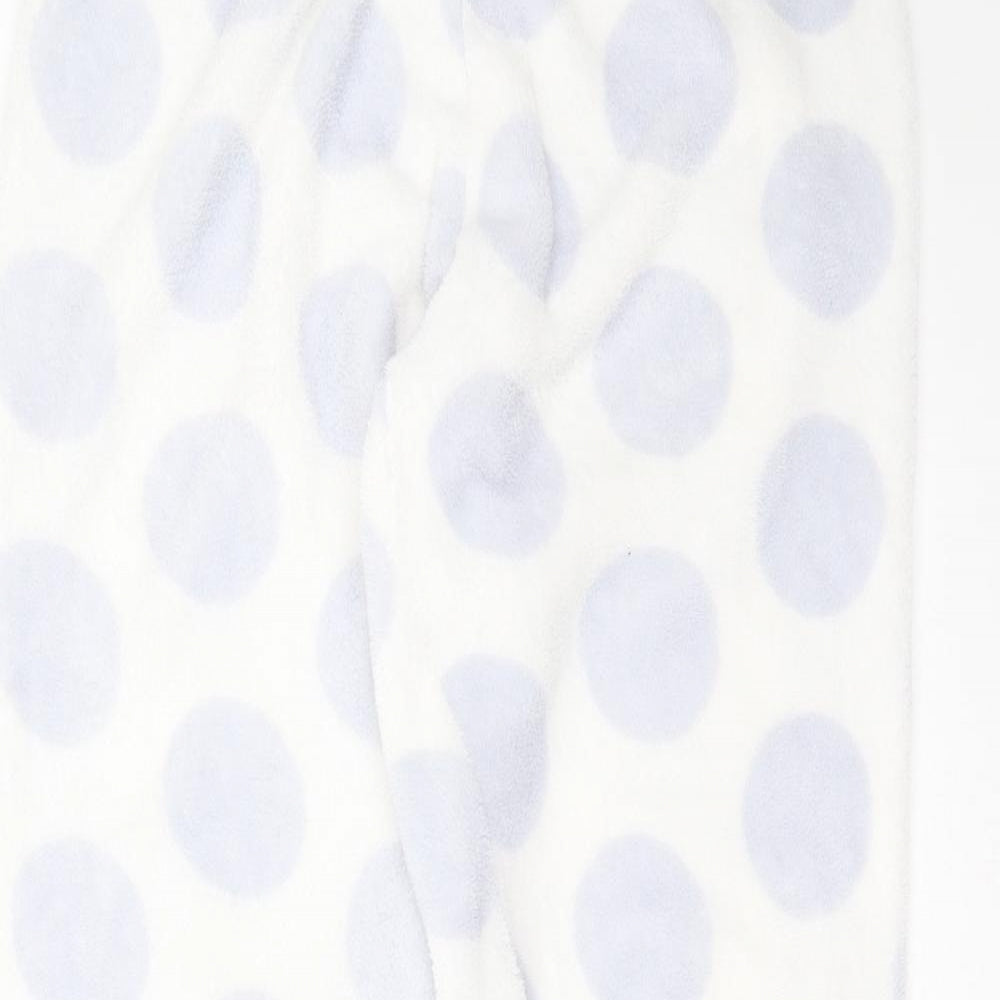 Close-up detail of Primark women’s white polka dot polyester pyjama pants, size M
