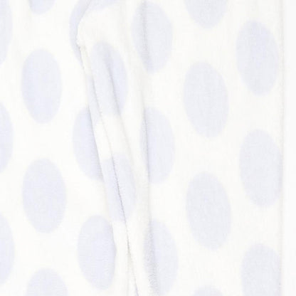 Brand and care label for Primark women’s white polka dot polyester pyjama pants, size M