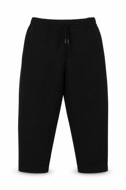 Front view of Zara girls’ black polyester capri trousers, size 9, months regular tie