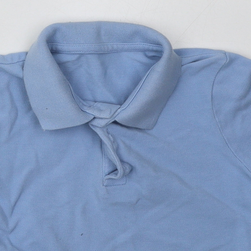 Close-up detail of Matalan boys’ blue cotton basic polo, size 5, years collared button - school wear