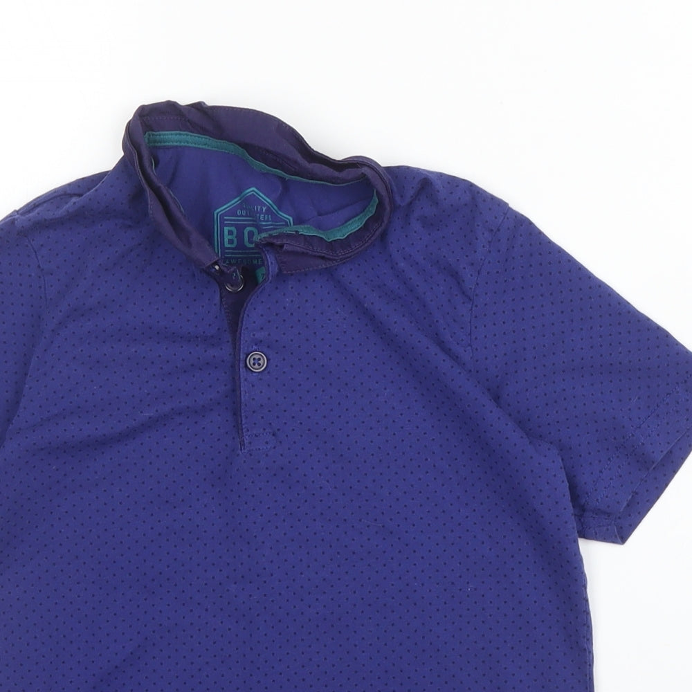 Close-up detail of Matalan boys’ blue cotton basic polo, size 7, years collared button