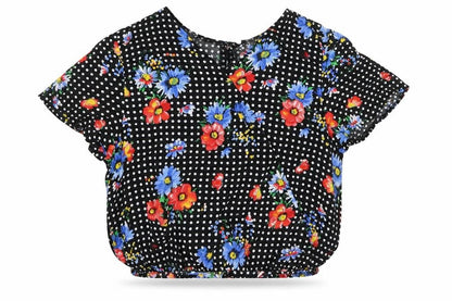 Front view of Primark girls’ multicoloured polka dot viscose basic blouse, size 9-10, years v-neck pullover - flowers