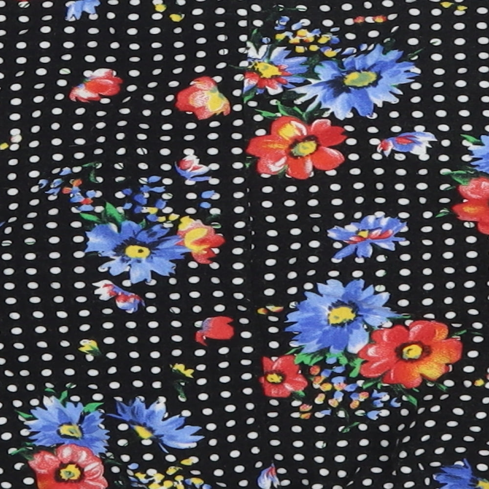 Brand and care label for Primark girls’ multicoloured polka dot viscose basic blouse, years v-neck pullover - flowers