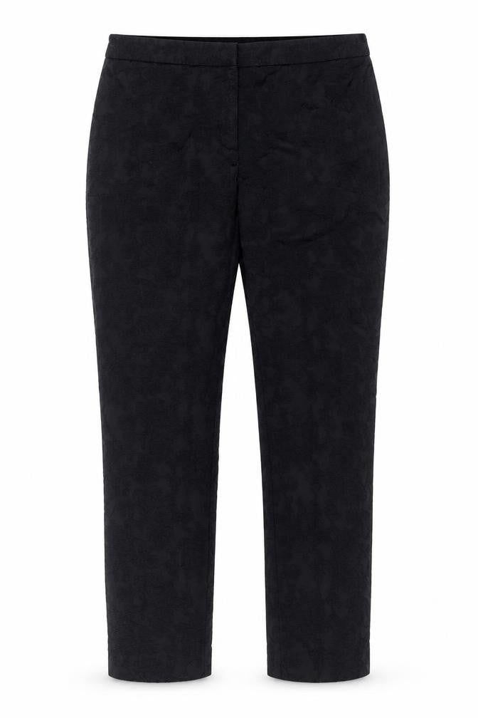 Front view of Marks & Spencer women’s black floral polyester blend trousers, size UK 36, in, 29-inch leg regular