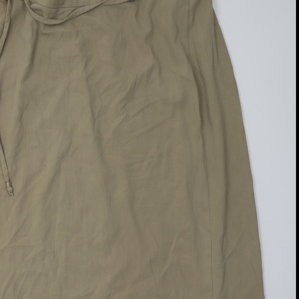 Close-up detail of Evans women’s beige polyester a-line skirt, size UK 22, tie