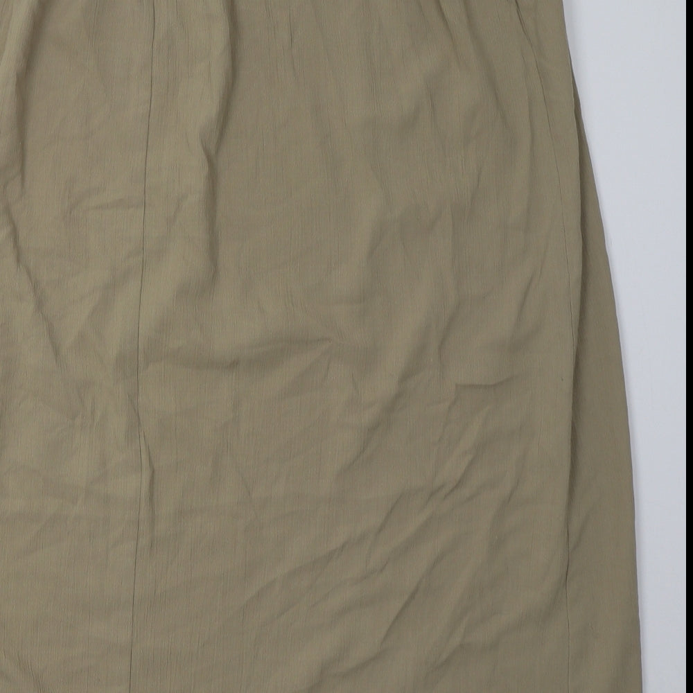 Brand and care label for Evans women’s beige polyester a-line skirt, size UK 22, tie