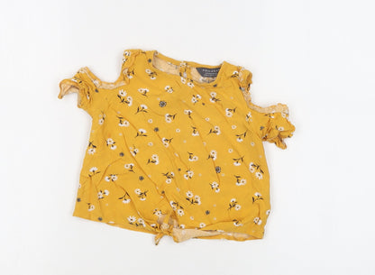 Front view of Primark girls’ yellow floral viscose basic blouse, size 2-3, years crew neck button