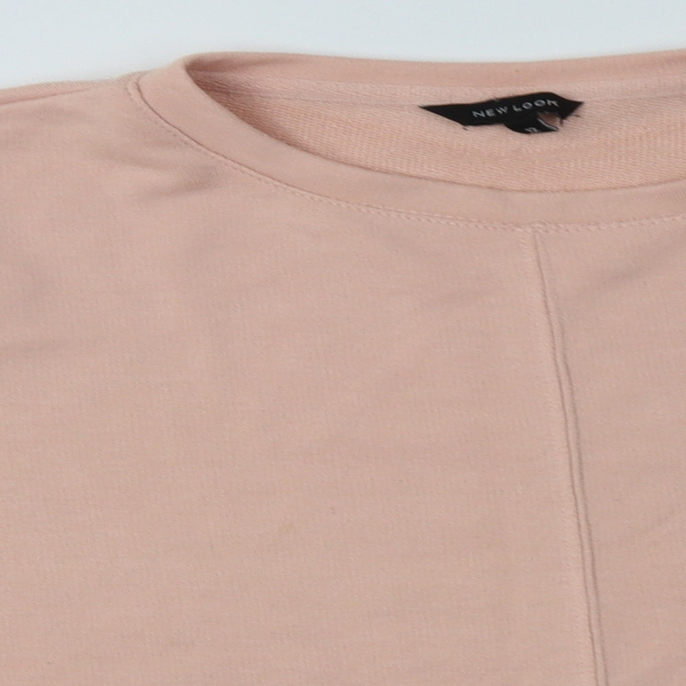 Close-up detail of New Look women’s pink polyester pullover sweatshirt, size UK 12, pullover