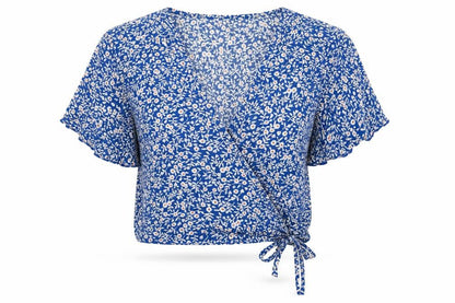 Front view of SHEIN women’s blue floral viscose cropped blouse, size XS, v-neck
