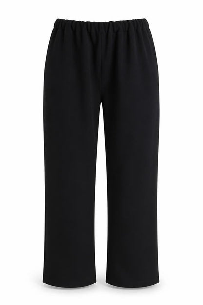 Front view of Preworn women’s black polyester trousers, size UK 30, in, 26-inch leg regular