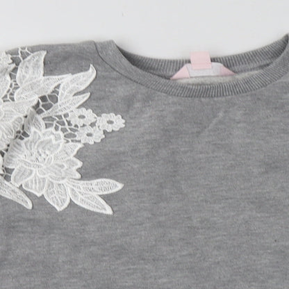 Close-up detail of Miss Selfridge women’s grey floral polyester pullover sweatshirt, size UK 10, pullover