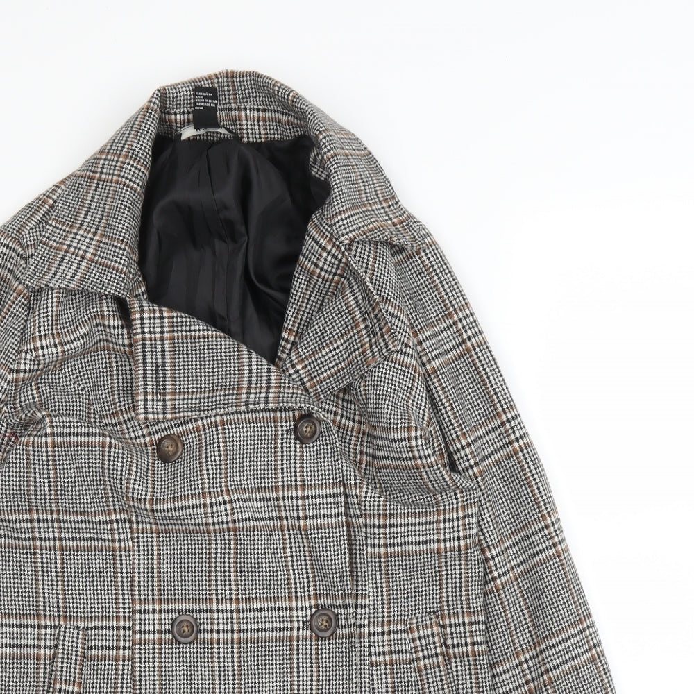 Close-up detail of Forever 21 women’s beige plaid pea coat blazer, size S, button