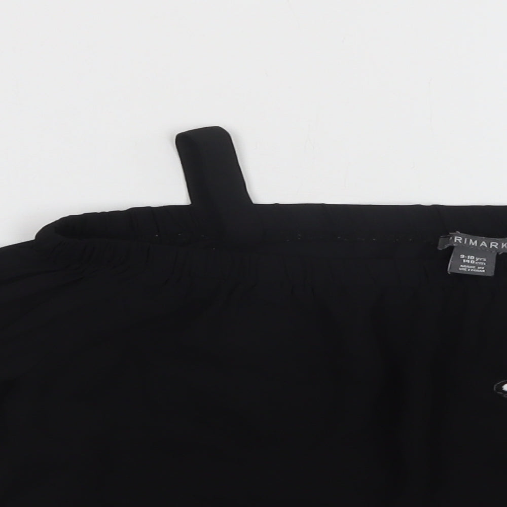 Close-up detail of Primark girls’ black polyester basic blouse, size 9-10, years off the shoulder