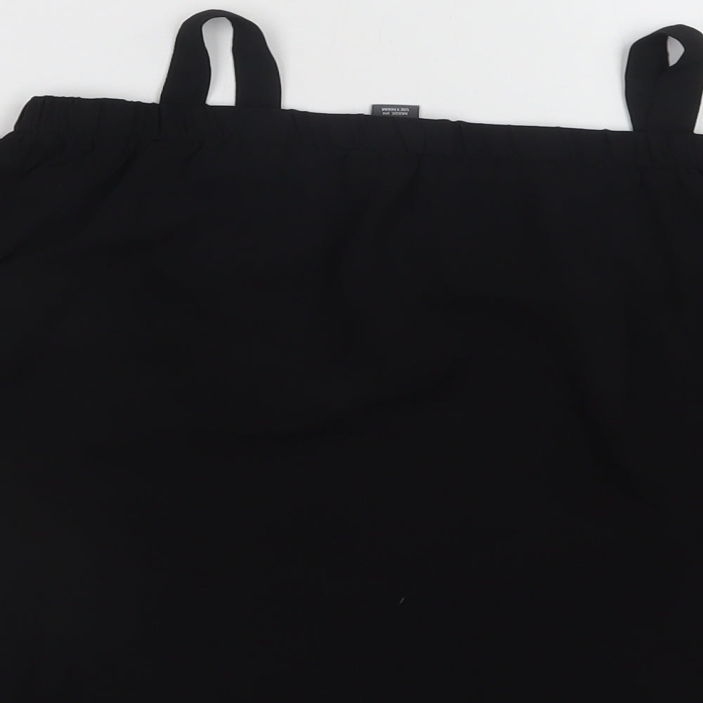 Brand and care label for Primark girls’ black polyester basic blouse, size 9-10, years off the shoulder