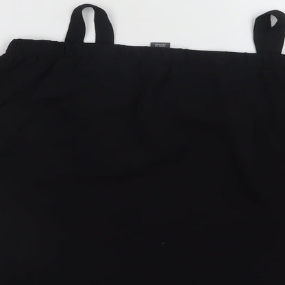 Brand and care label for Primark girls’ black polyester basic blouse, size 9-10, years off the shoulder