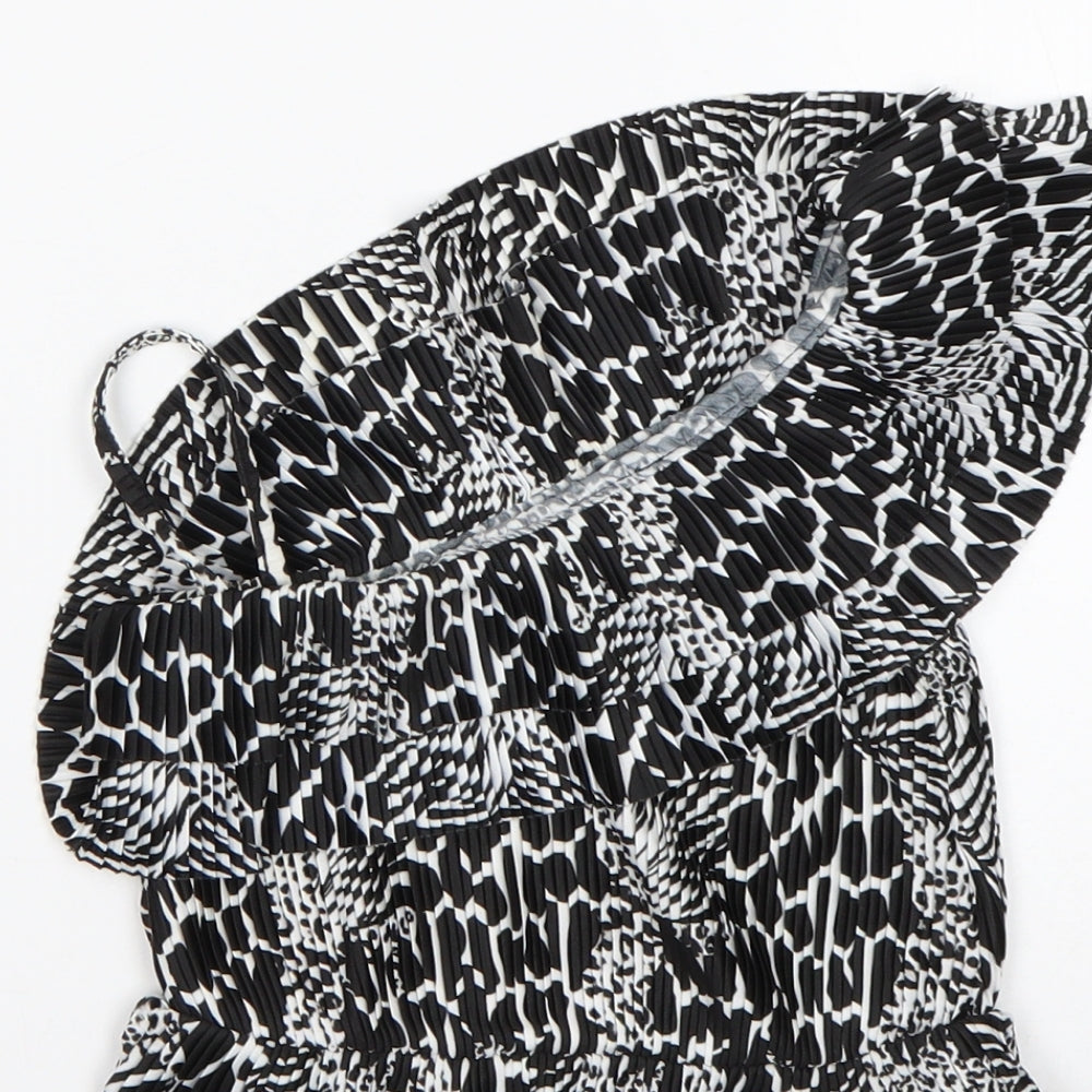 Brand and care label for Next girls’ multicoloured animal print polyester basic blouse, size 4, years one shoulder