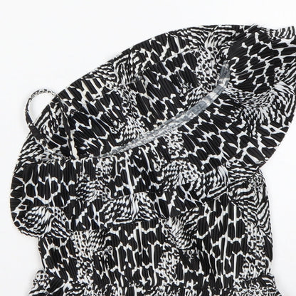 Brand and care label for Next girls’ multicoloured animal print polyester basic blouse, size 4, years one shoulder