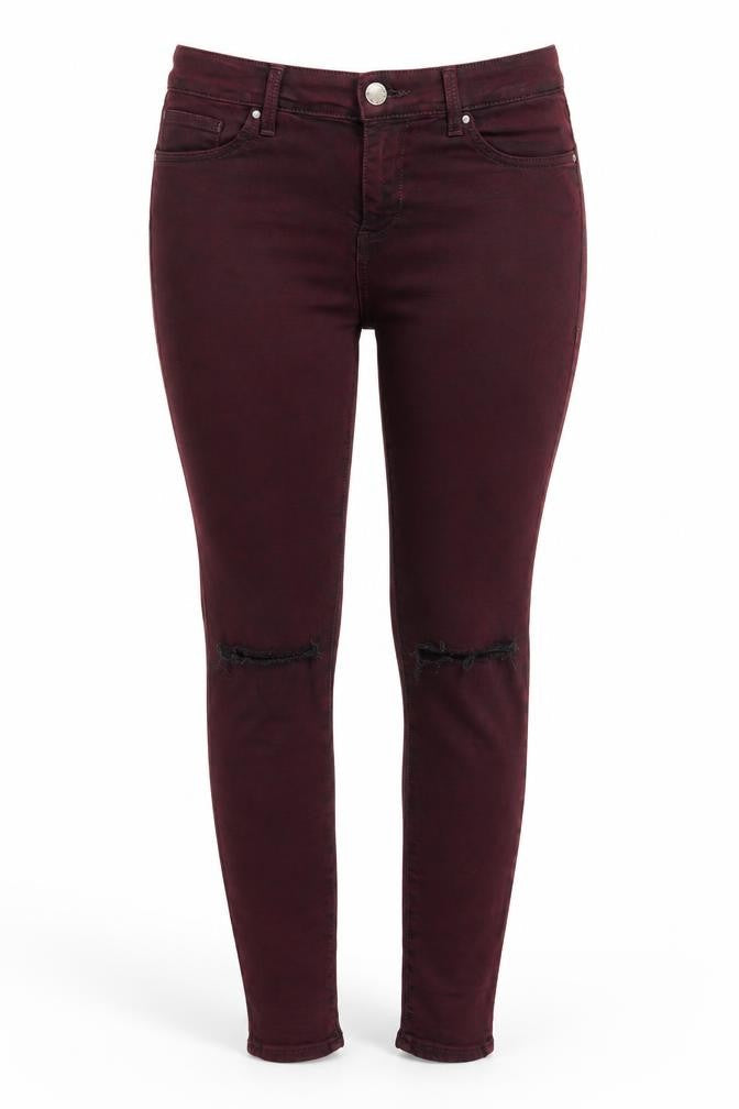 Front view of Topshop women’s purple cotton skinny jeans, size UK 28, in, 27-inch leg regular button