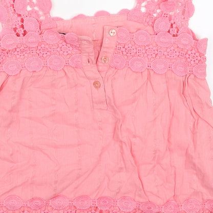Brand and care label for River Island girls’ pink cotton basic tank, size 5, years square neck button