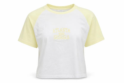 Front view of Primark women’s yellow cotton cropped t-shirt, size UK 4, crew neck - atlanta 1994