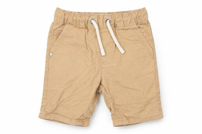 Front view of Next boys’ beige cotton capri trousers, size 12, months drawstring
