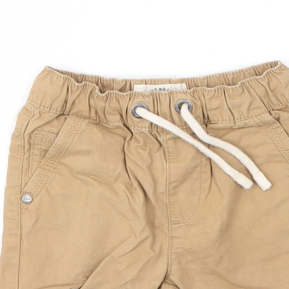 Close-up detail of Next boys’ beige cotton capri trousers, size 12, months drawstring