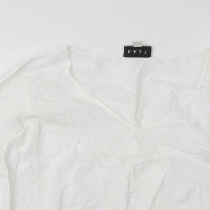 Close-up detail of East women’s white geometric cotton pullover sweatshirt, size UK 10, pullover
