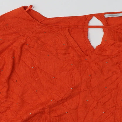 Close-up detail of trend women’s orange viscose pullover sweatshirt, size UK 14, pullover