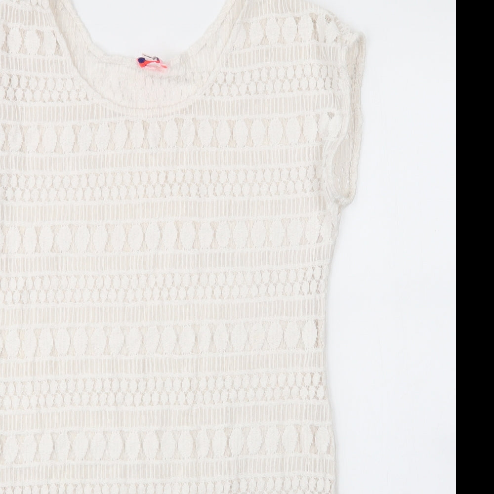 Close-up detail of Stella & Dot women’s white cotton shift, size M, round neck