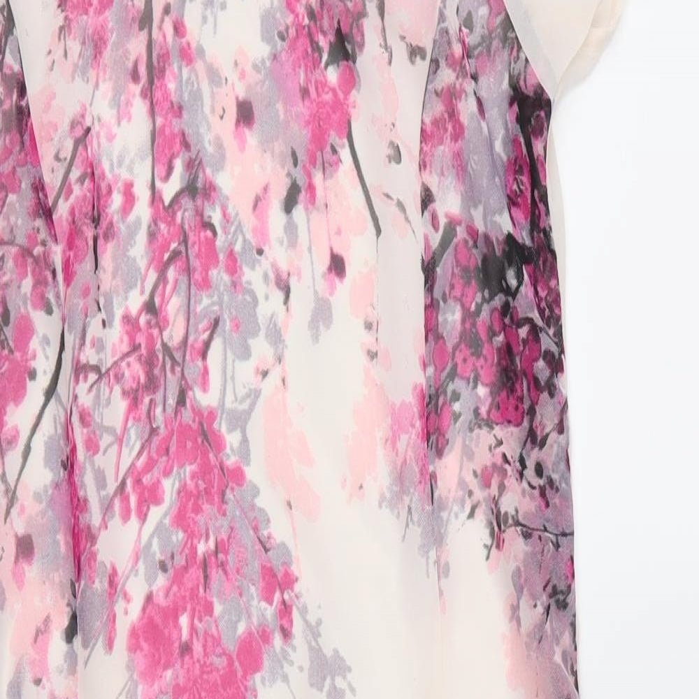 Close-up detail of Melange women’s beige floral polyester shift, size M, round neck