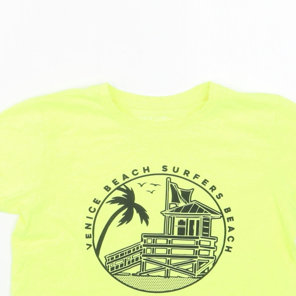 Close-up detail of Primark girls’ green polyester basic t-shirt, size 7-8, years crew neck