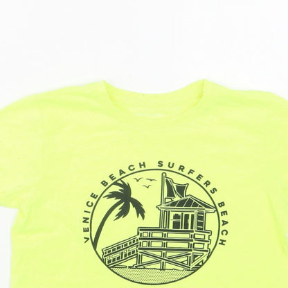 Close-up detail of Primark girls’ green polyester basic t-shirt, size 7-8, years crew neck