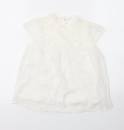 Front view of George girls’ white nylon basic blouse, size 7, years round neck button
