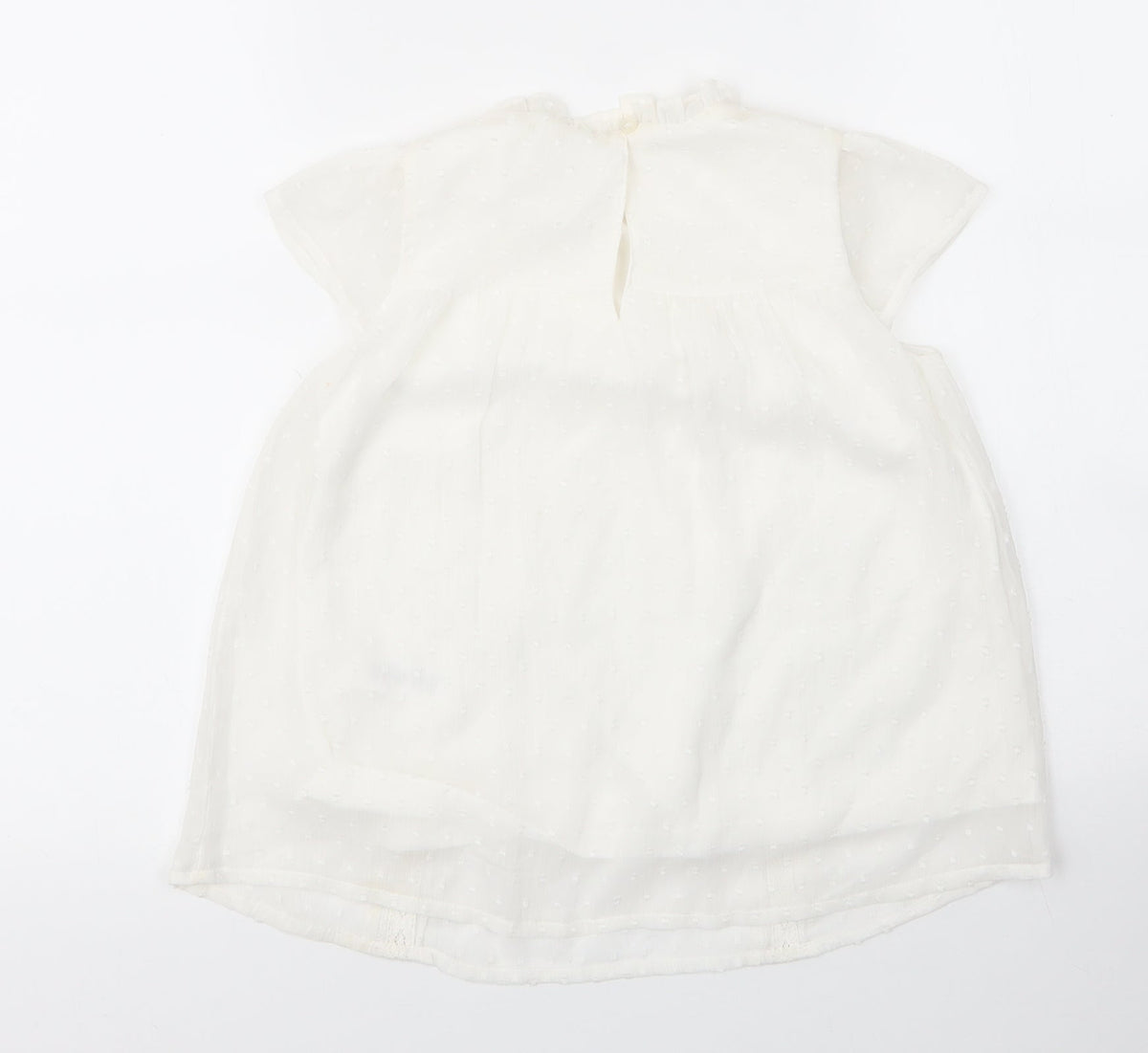 Back view of George girls’ white nylon basic blouse, size 7, years round neck button