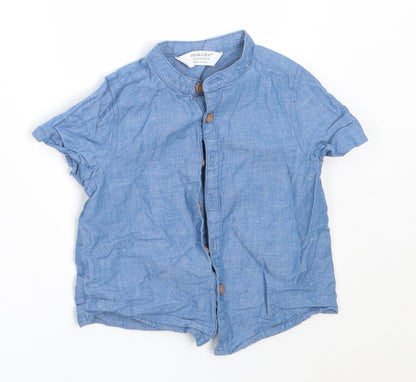 Additional front view of Primark boys’ blue cotton basic button-up, size 9-12, months round neck