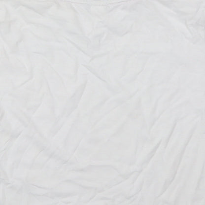 Brand and care label for Umbro boys’ white polyester basic t-shirt, size 5-6, years v-neck pullover