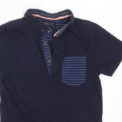 Close-up detail of Next boys’ blue cotton basic polo, size 6, years collared pullover