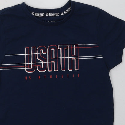 Close-up detail of Matalan boys’ blue cotton basic t-shirt, size 6, years crew neck pullover