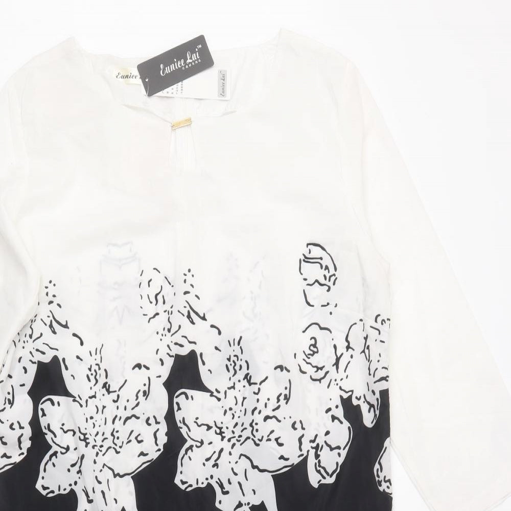 Close-up detail of Eunice Lai women’s white floral polyester shift, size L, round neck zip