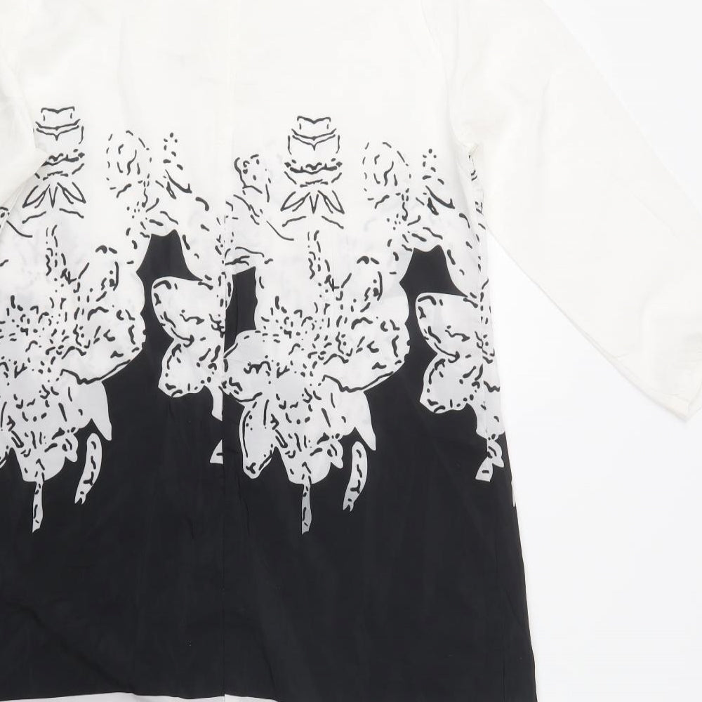 Brand and care label for Eunice Lai women’s white floral polyester shift, size L, round neck zip