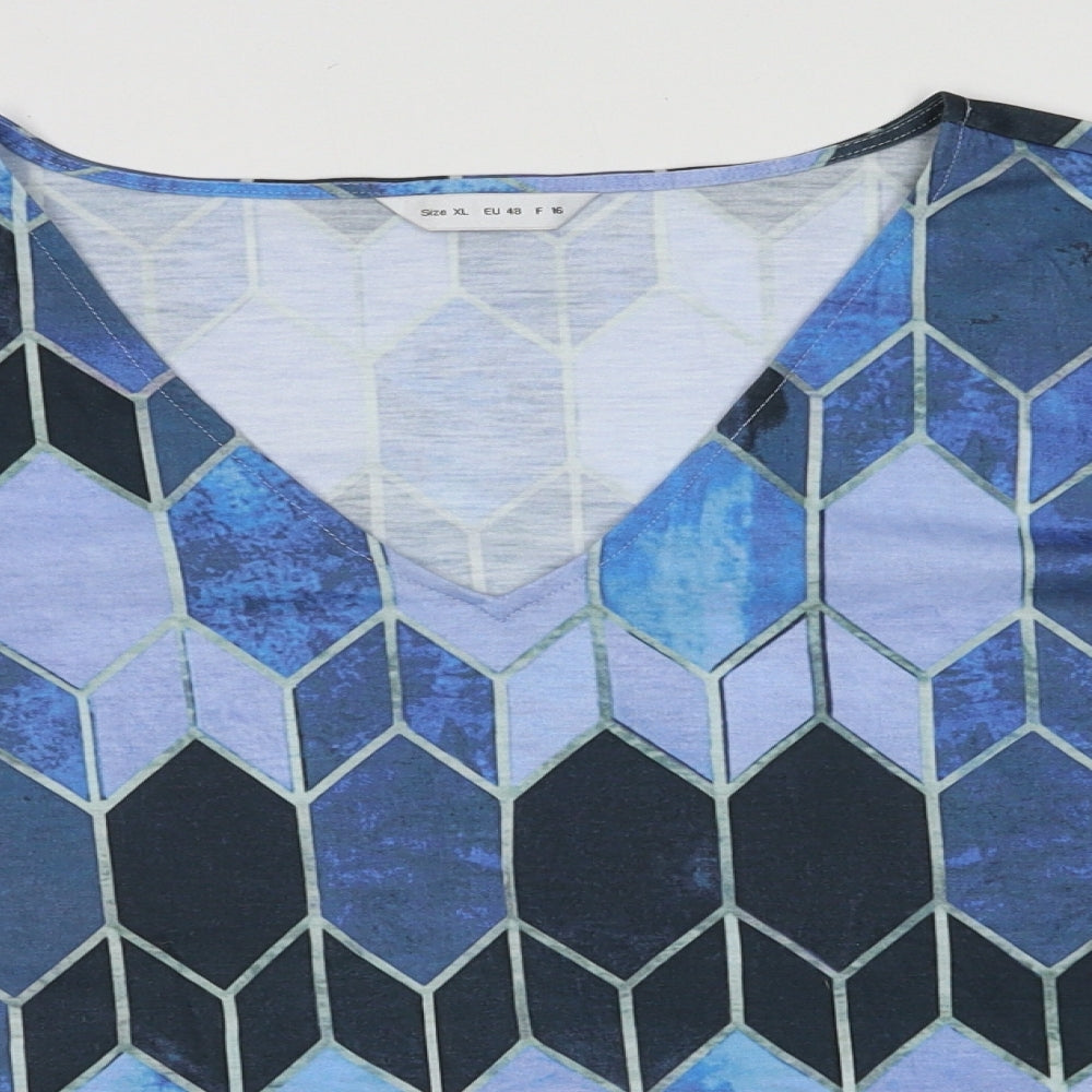 Close-up detail of women’s blue argyle/diamond polyester pullover sweatshirt, size XL, pullover