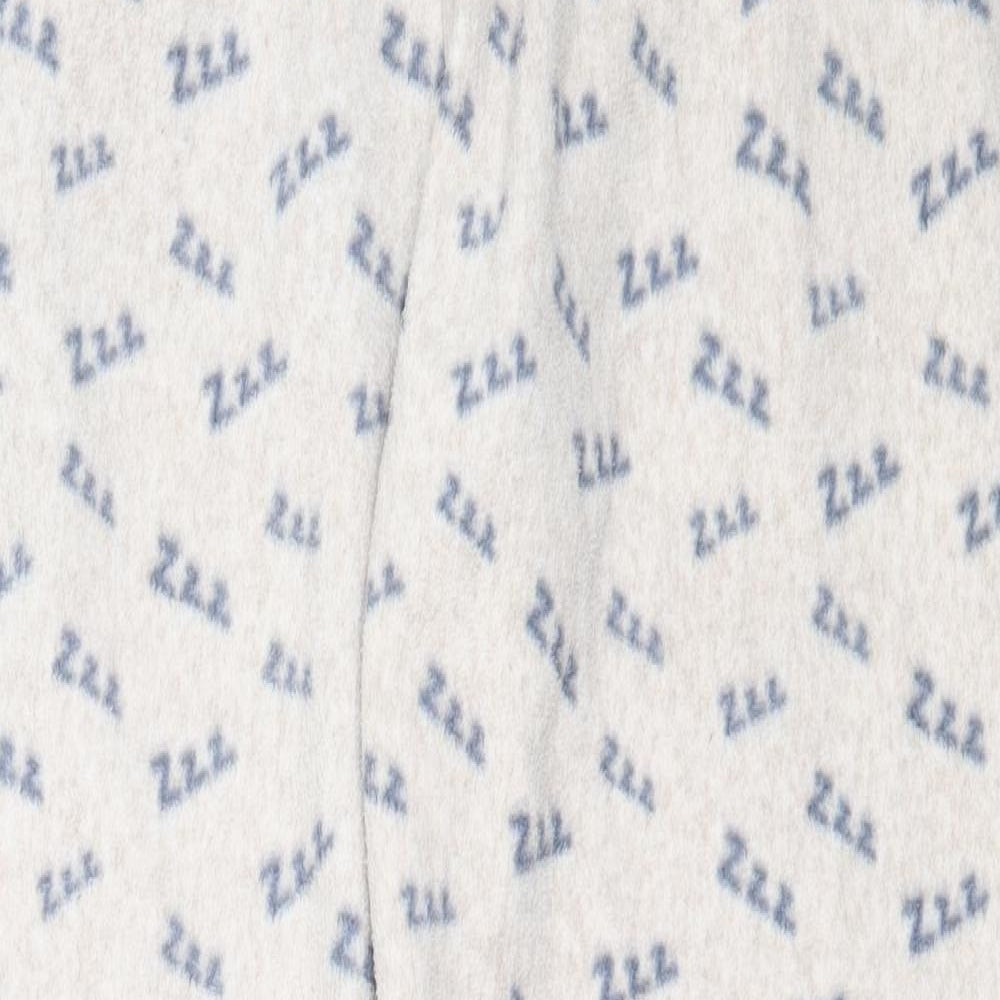 Close-up detail of Primark women’s beige solid polyester capri pyjama pants, size S