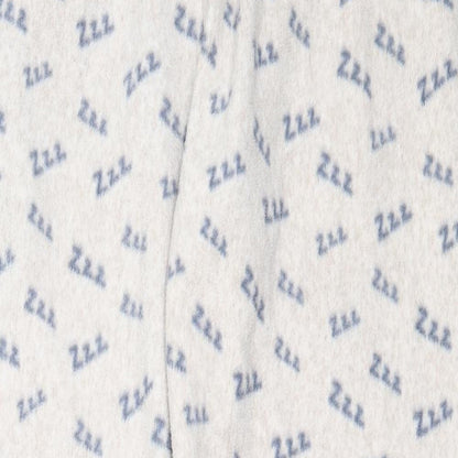 Close-up detail of Primark women’s beige solid polyester capri pyjama pants, size S