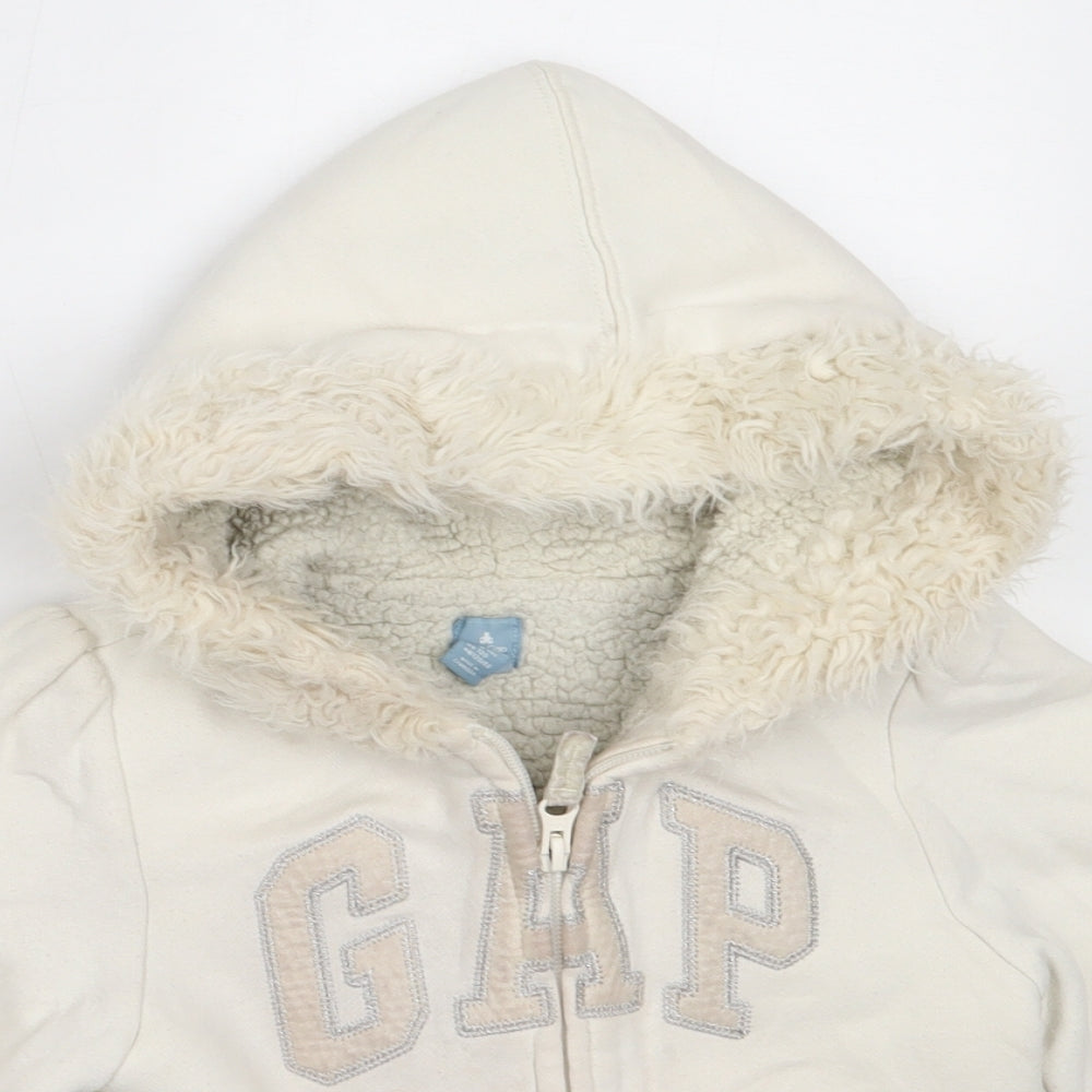 Close-up detail of Gap girls’ ivory jacket, size 5, years