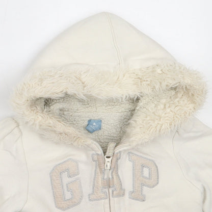 Close-up detail of Gap girls’ ivory jacket, size 5, years