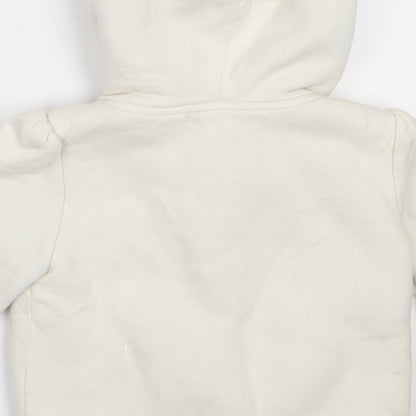 Brand and care label for Gap girls’ ivory jacket, size 5, years