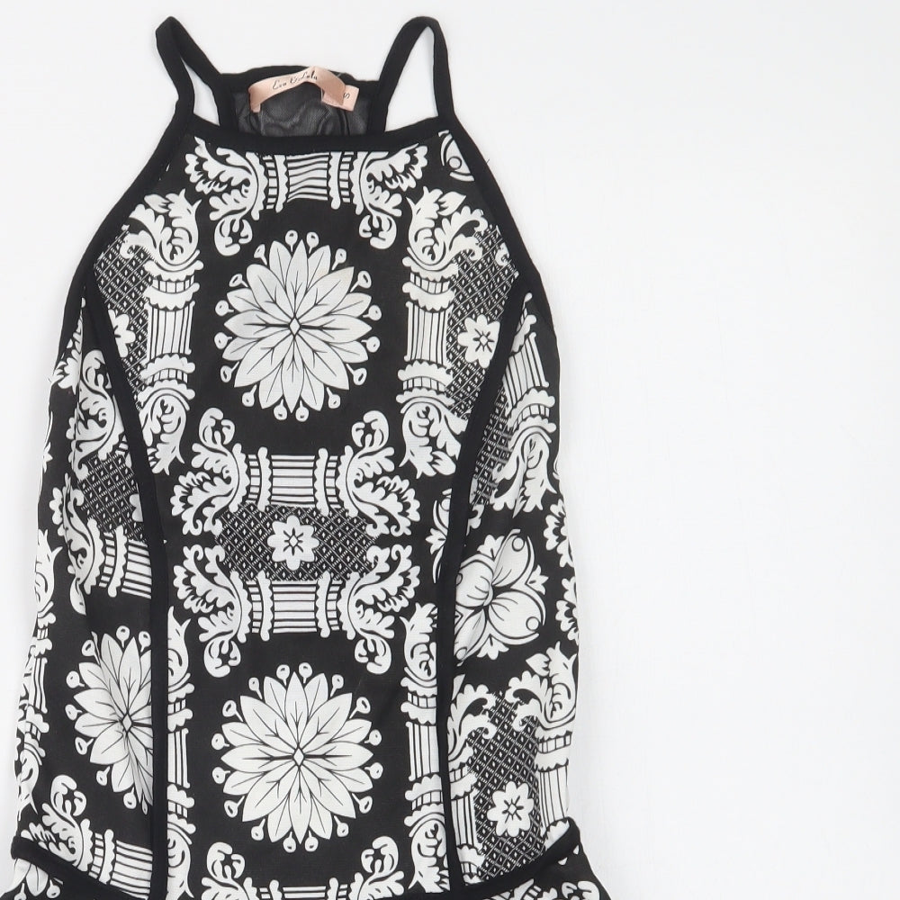 Close-up detail of Eva & Lola women’s black floral basic blouse, size S, square neck