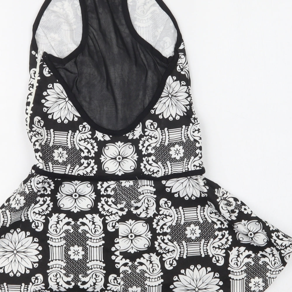 Brand and care label for Eva & Lola women’s black floral basic blouse, size S, square neck